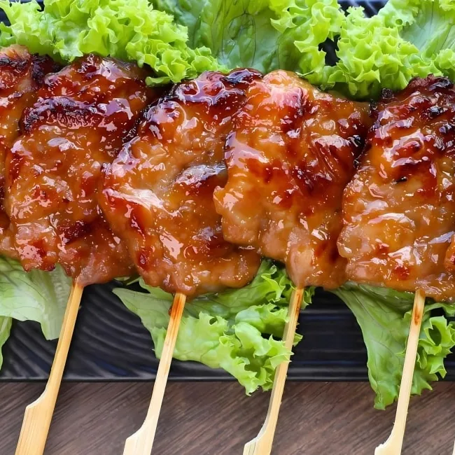 Grilled Thai moo ping skewers